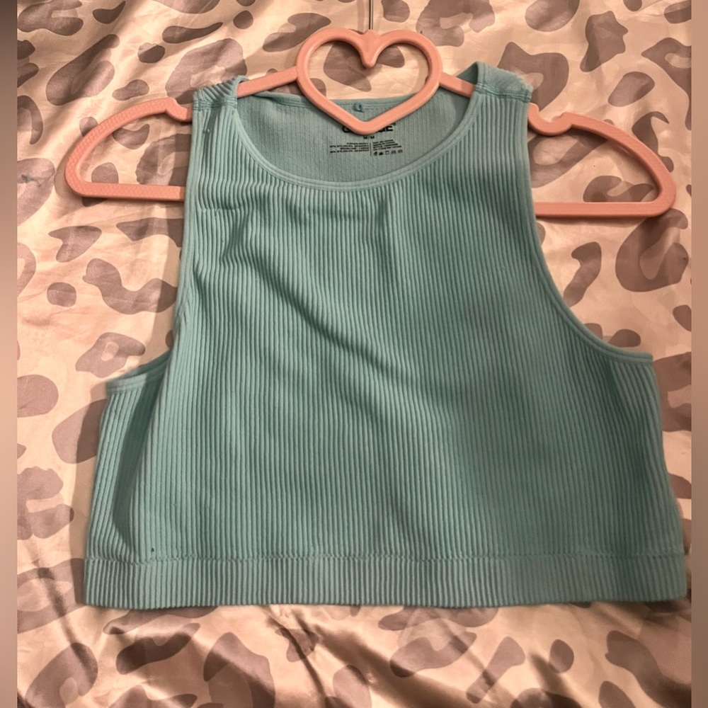 Garage size medium teal boat neck ripped tank top